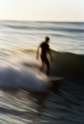 Surfer Riding a Wave